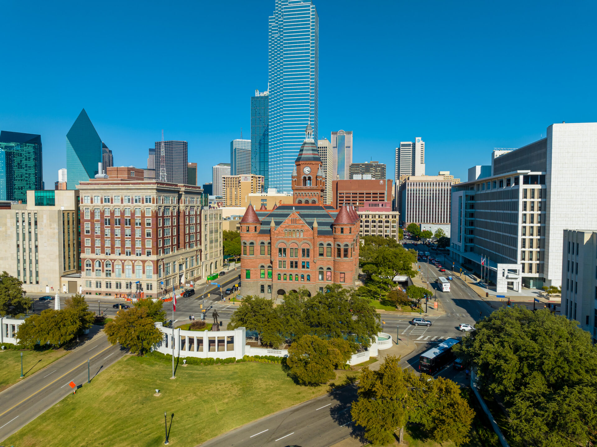 Aerial view of the Old Red Museum in Dallas with skyscrapers in the background.