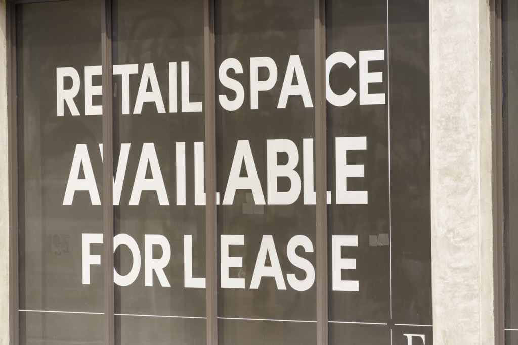Retail space available for lease sign on window
