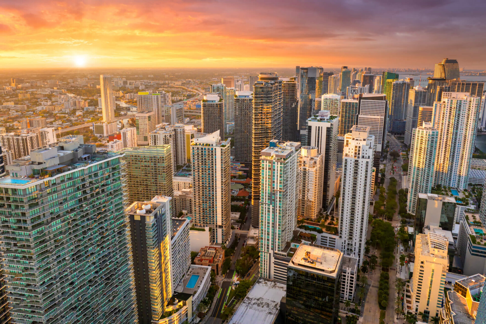 Aerial view of Miami skyline with skyscrapers at sunset